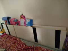Bed with side tables and spring mattress