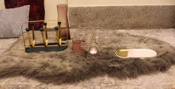 rug, candle stand, glass holder stand