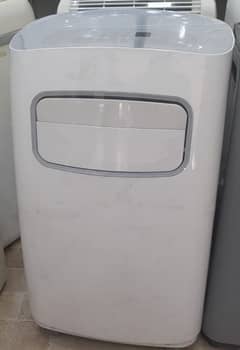 imported portable ac with full accessories pipe hose and everything