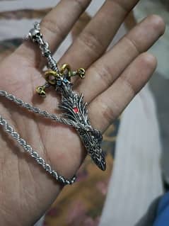 Goat skull and demon sword pendant