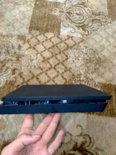PS4 slim with 500 GB storage original controller 4 games