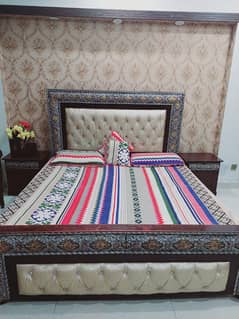 Bed with side tables.