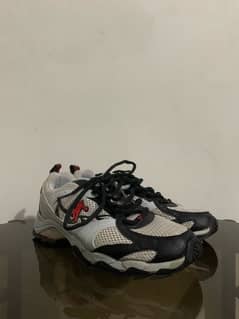 Running shoes or Cricket shoes