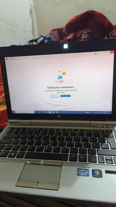 ued mai laptop hn hp ka beetry timing bi thk hn or charger bi hn on h 2