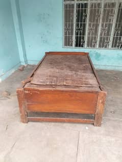 single wooden bed