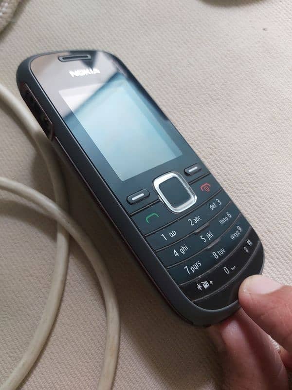 Nokia 1661 keypad Device 0