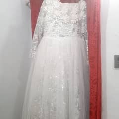 White maxi with beautiful design and  flear