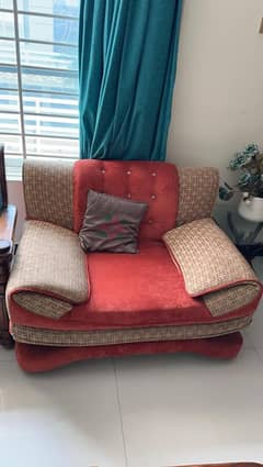 2 One seater Sofas