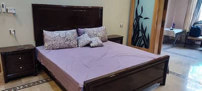 Wooden Bed With sidetables and Dressing.
