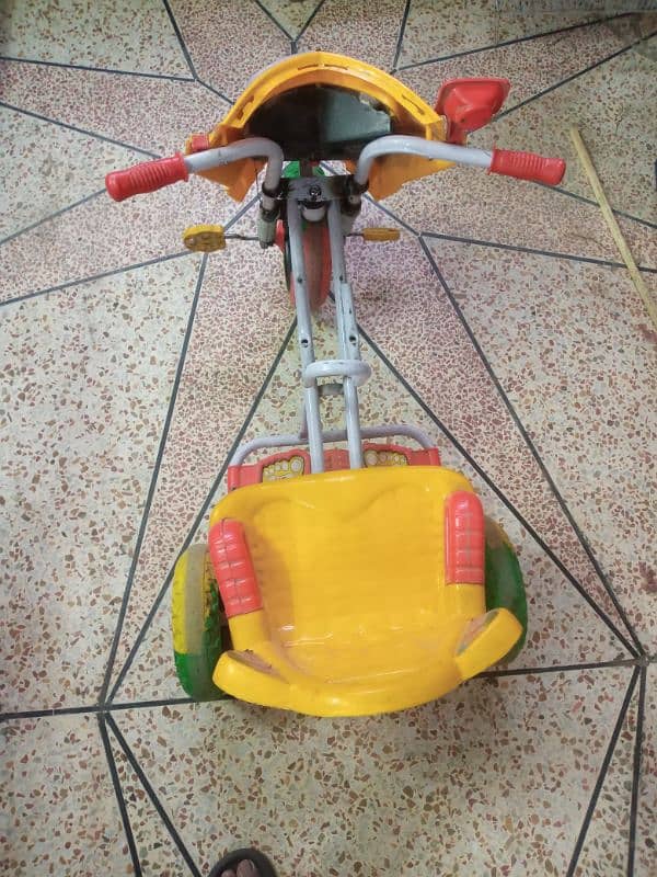 kids 3 tires cycle double seater front and back 1