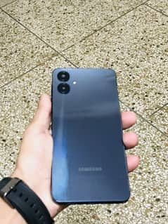 samsung A06 4 64 with box one month use 10/10