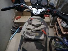 united deluxe 125 with 5 gears and self start , black color ,