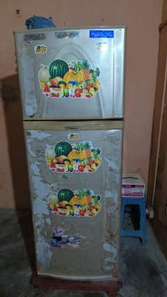 Dawalance refrigerator is large and running