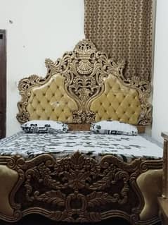 bed, side tables and dressing table