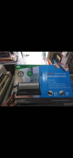 metal comb punch & bind machine, new, with pins