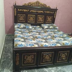 wooden bed with dressing and 1 side table