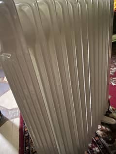 Dots oil filled electric heater