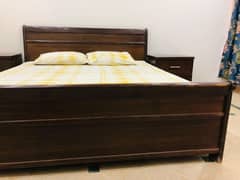 king size bed with side tables and molty foam mattress