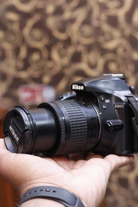 Nikon D3400 with 18/55mm perfect condition with Bluetooth. 0