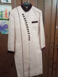 groom sherwani and 2 piece suit