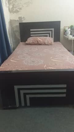 Wooden bed single