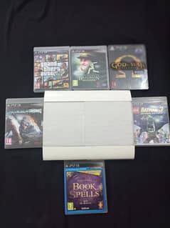 ps3 sony company with 6 cds and gaming controller