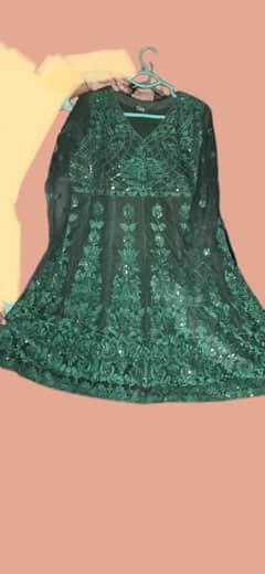 Emerald green dress with a fresh embroidery