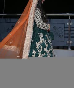 Green and orange bridal  dress from khan fashion vibes rabi center