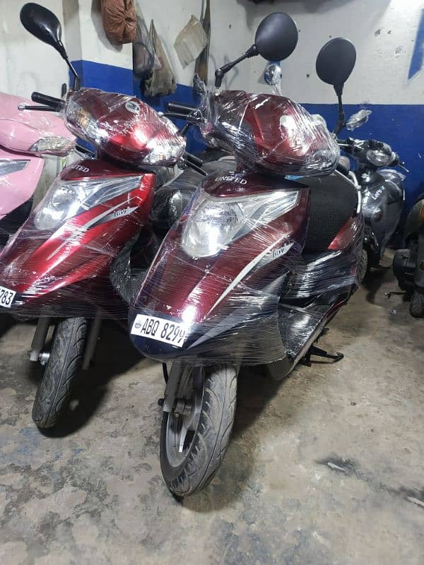 united scooters,electronic scooters,49cc scooties available 0