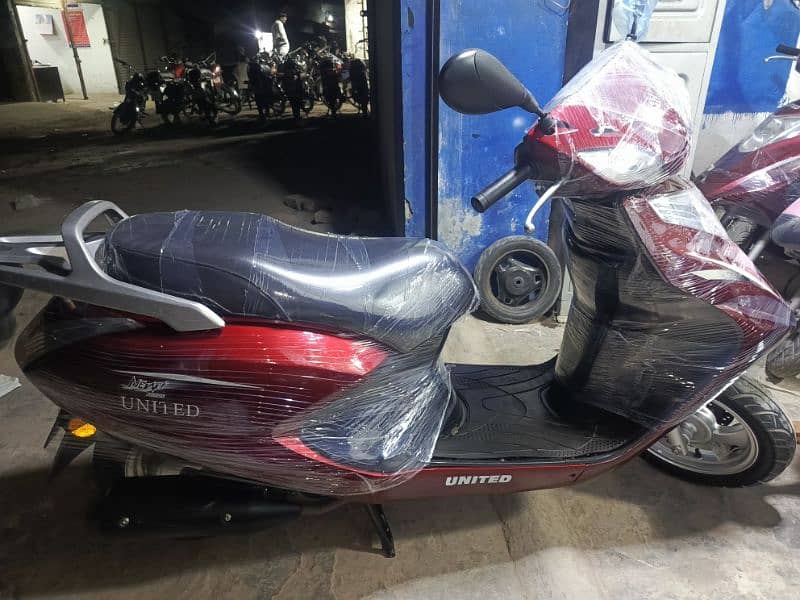 united scooters,electronic scooters,49cc scooties available 6