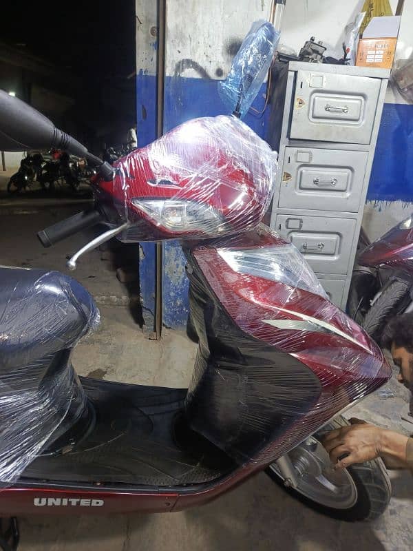 united scooters,electronic scooters,49cc scooties available 7