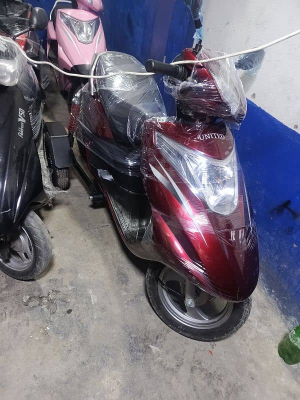 united scooters,electronic scooters,49cc scooties available 9