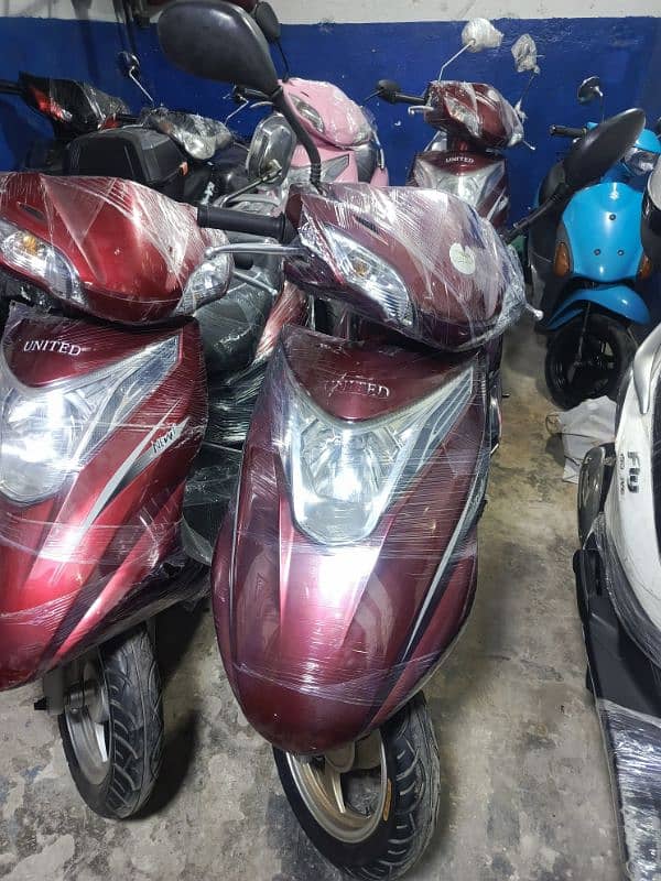 united scooters,electronic scooters,49cc scooties available 16