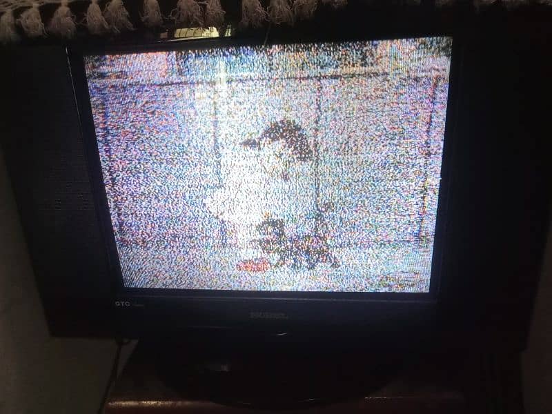 A wooden bed and dressing with side tables Nobel TV 10