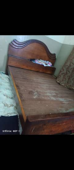 Wooden double bed for sale