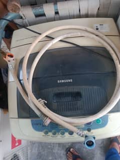 Samsung fully automatic washing and dryer machine with fitting pipe