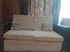 3 sofa sets along with tables