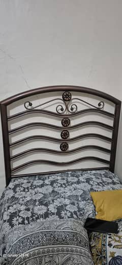 Single bed in copper brown color