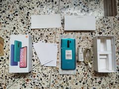 Redmi 9 green color 4/64 GB with original box and charger