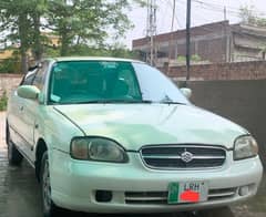 Suzuki Baleno 2003. chilled AC. lpg py 20 km average.