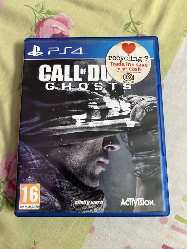 PS4 with 2 controllers and 8 games full settle 7