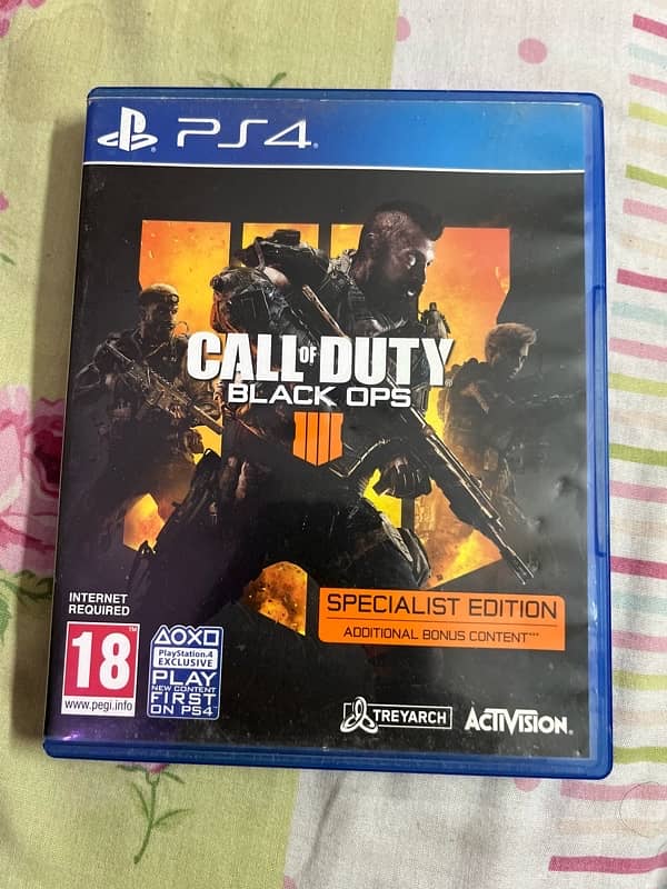 PS4 with 2 controllers and 8 games full settle 10