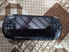 psp 3000 slim edition new condition with 5 games (exchange possible )