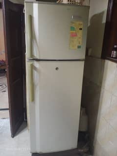 Medium size refrigerator in good condition