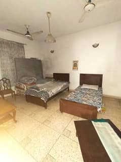 Spacious 10 Marla Double Story House for Sale on 60 Ft Road in Faisal Town Lahore