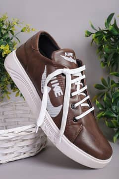 stylish men's brown leather sneakers. limited stock