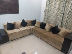 L Shaped sofa with 10 cushions perfect condition
