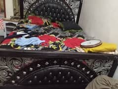 bed and dresing table