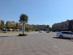 Beautiful Location Sector A Commercial Plot (30*30) Available For Sale Ideal Location Reasonable Demand. On Main Entrance.