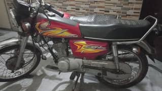10/9 Honda 125 red colur first owner